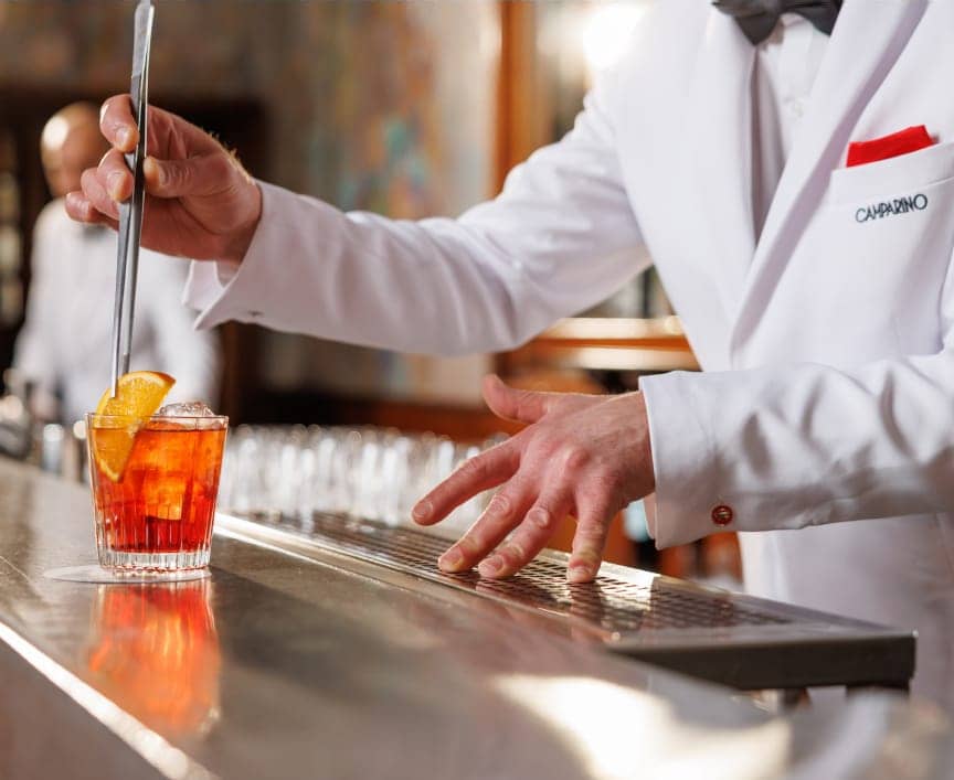 barman preparing a cocktail at Bar di Passo